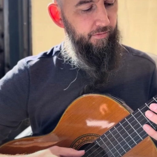 AJ Potter playing classical guitar